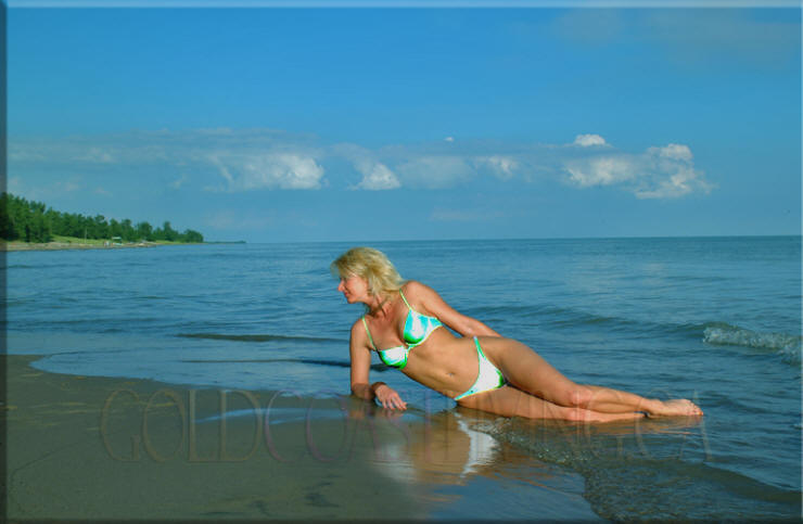 Photograph of woman on Long Point Beach, Norfolk County on Lake Erie, Ontario
