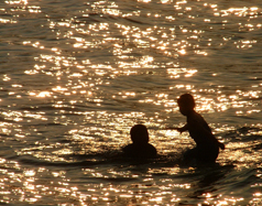 Photograph of boys in Lake Erie in Port Dover on the Gold Coast, South Coast of Ontario, Norfolk County on Lake Erie